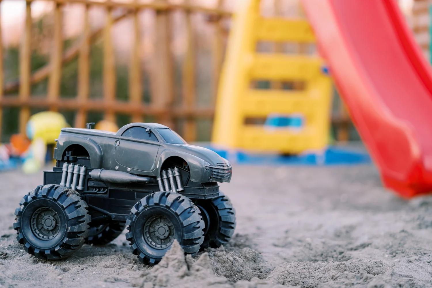 toy-bigfoot-jeep-stands-on-the-sand-at-a-colorful-2024-06-25-01-50-51-utc - JC Whitney