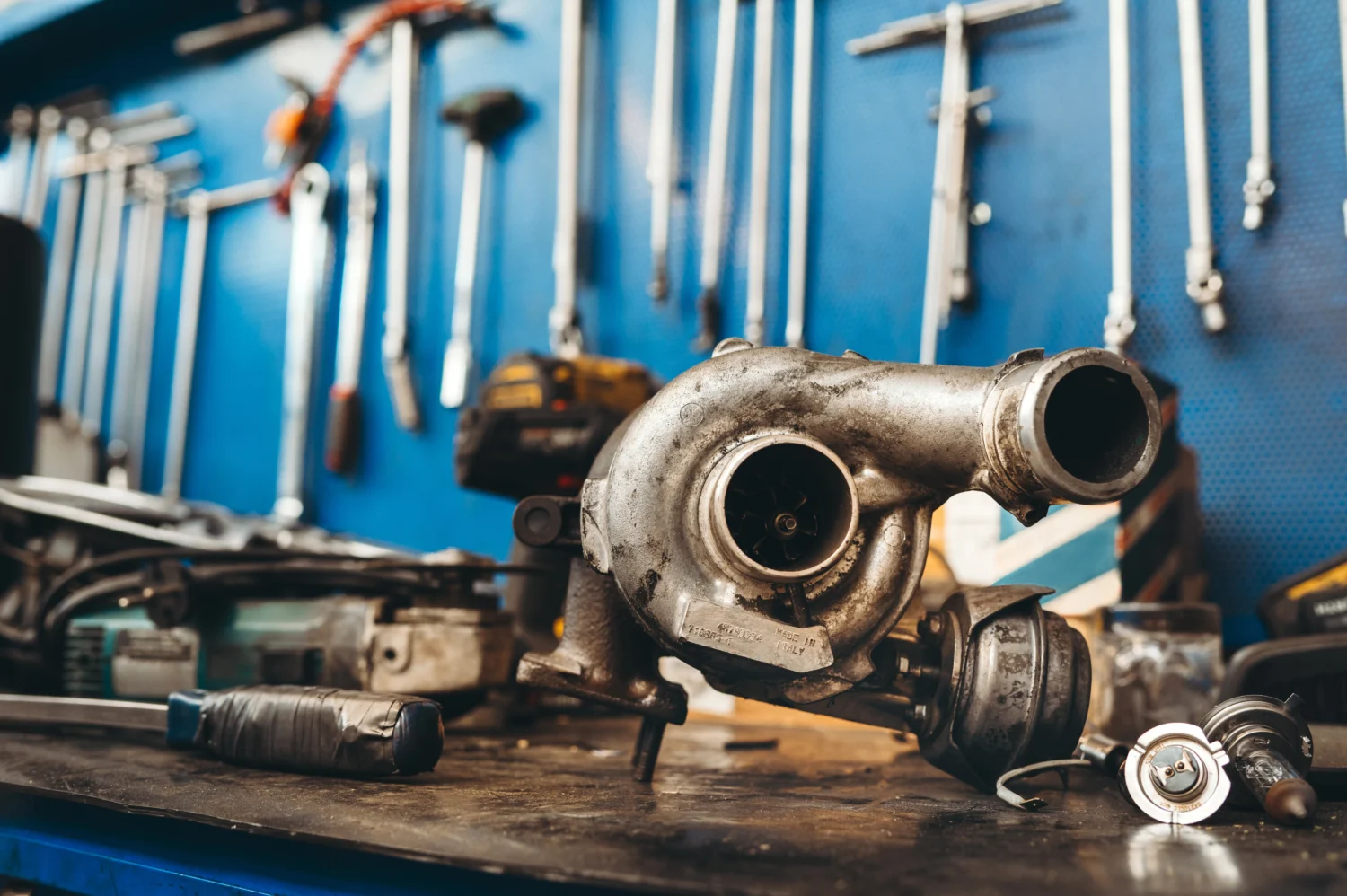 turbo-motor-on-repairing-desk-in-mechanic-workshop-2024-04-02-19-59-28-utc - JC Whitney